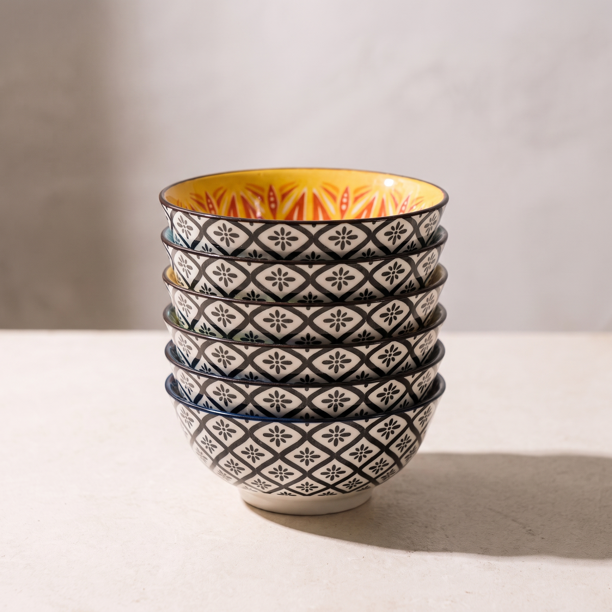 The six bowls stacked in one column