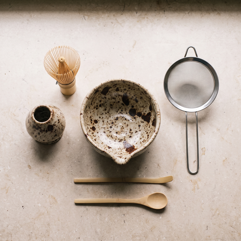 Japanese matcha tea ceremony set, six pieces on a limestone worktop